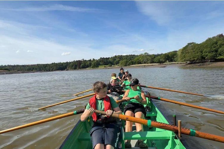 The team from Cotehele Quay Gig Club jumped at the chance to row out and join the flotilla as it was finishing the first stage of a two-day row covering 22 miles along the river Tamar. (Picture: Kim Lakey/Cotehele Quay Gig Club)
