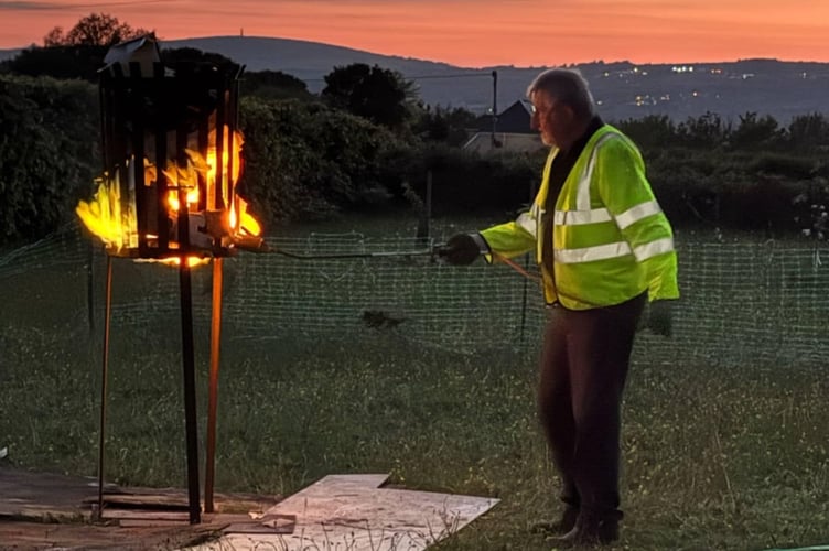 More than 100 villagers attended the lighting of a VE Day 80 beacon of peace at Bere Alston Bowling Club. West Devon Borough councillor Graham Reed lit the beacon, the Rev Nick Law led prayers and the Last Post and Reveille sounded by Tavistock Stannary Brass Band bugler Peter Hurdwell.