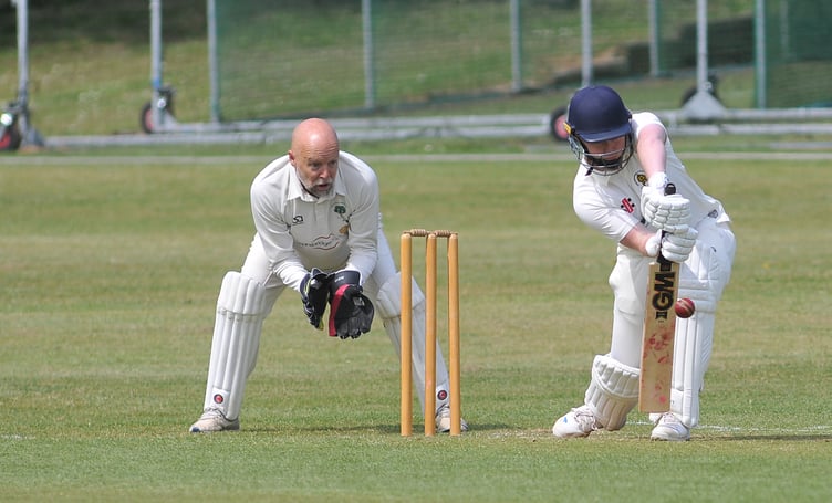 Devon Cricket League E Division West. Abbotskerswell 2nd XI versus Whichurch Wayfarers 1st XI. Whitchurch 'keeper Nigel Barriball and Abbots' batsman M Yates
Abbotskerswell won by 85 runs