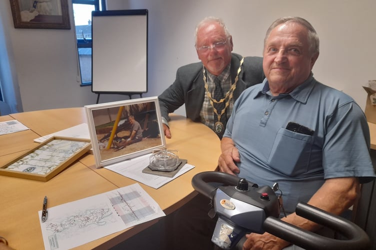 Thanking a community-minded councillor on the Bere Peninsula Cllr Richard Leithall, Chair of Bere Ferrers Parish Council, presenting David Pengelly with a retirement award.