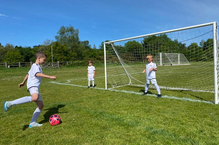 Tavistock Independent Football Academy U-8s shooting practice for an international tournament.