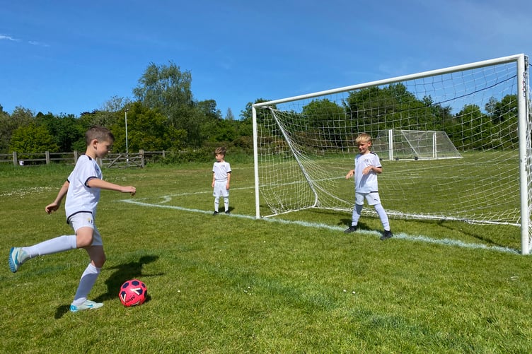 Tavistock Independent Football Academy U-8s shooting practice for an international tournament.