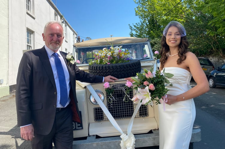 Father of the groom Steve Marker and his son Callum's new bride Lydia Whitby who he drove to their Tavistock wedding in the old Land Rover he lovingly restored.