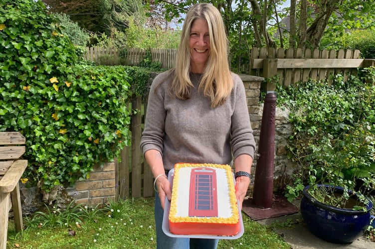 A red phone box celebration cake to round off the official opening of the community museum held by its new custodian, Bryonie Baxter. (Picture: Sarah Martin)
