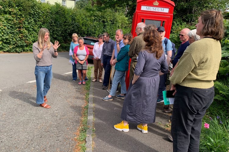 Local resident Bryonie Baxter who stepped in to save the phone box and give a new lease of life chatting to guests at the official opening of the phone box on Bal Lane. (Picture: Sarah Martin)