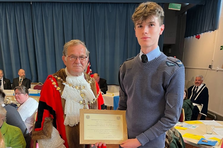 Cadet Corporal Alex Ford 2443 (Okehampton) Squadron with his award.
