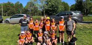 Girl footballers complete walk for new kit