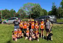 Horrabridge girl footballers complete walk for new kit
