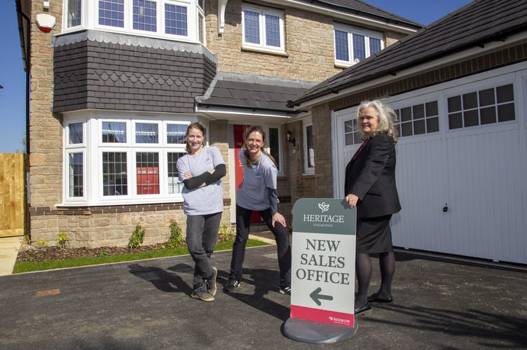 Ellodie Stott and Lynn Rogers of the Okehampton Dance Group with Sarah Smith of Redrow Homes, pictured at their Romansfield development in Okehampton.