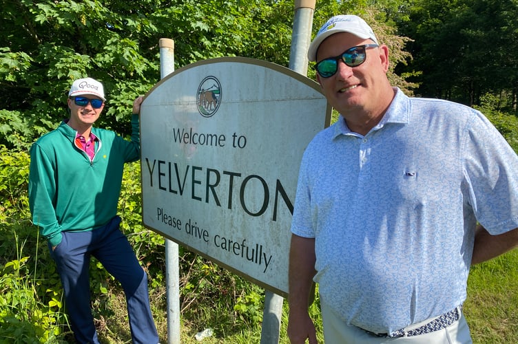 Son and father and Devon and Mike Yelverton (far left and far right) at their namesake village of Yelverton. 