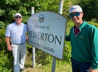 Tourists visit their namesake village