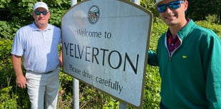 Tourists visit their namesake village