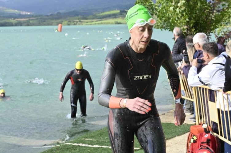 Sam Lake of Tavistock Swimming Club leaving her swim leg of the European Aquathlon Championship where she won the age title