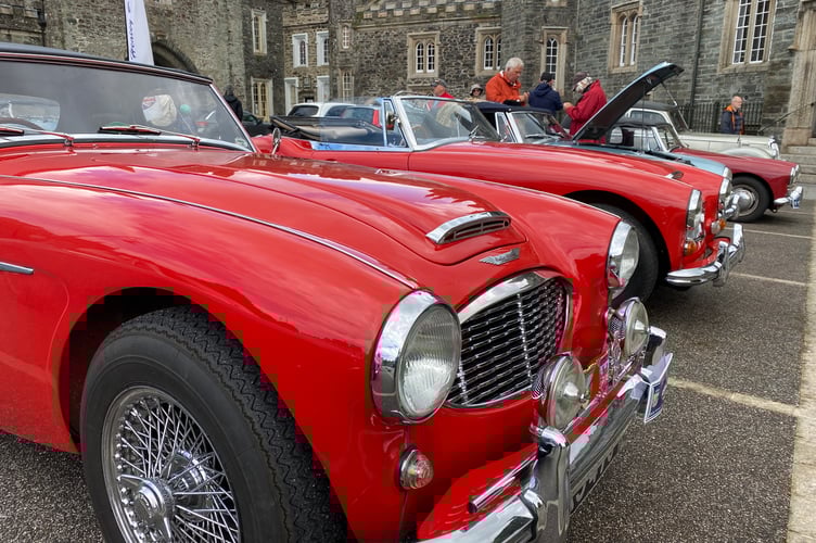 Pretty in red - Austin Healey sports cars line up in Tavistock's Bedford Square for a rally of the model.