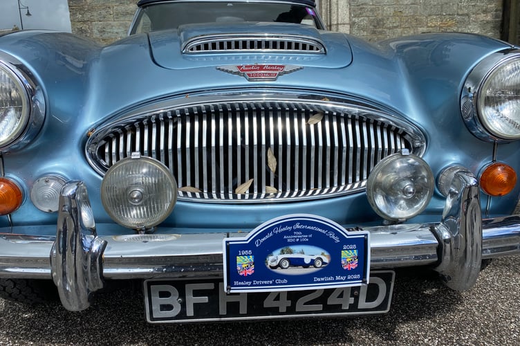 A highly polished Austin Healey sports car lines up in Tavistock's Bedford Square for a rally of the model.