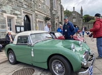 Classic sports car draws crowds
