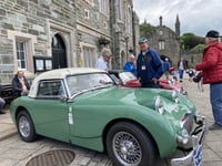 Classic sports car draws crowds
