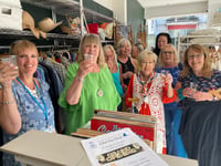 Charity shop reopens after flood rescue