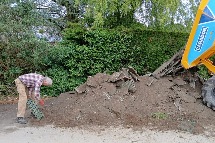 The community group worked on the project all week digging up a large section of the car park and refilling with 100 tonnes of stone. (Picture: Calstock Parish Council)