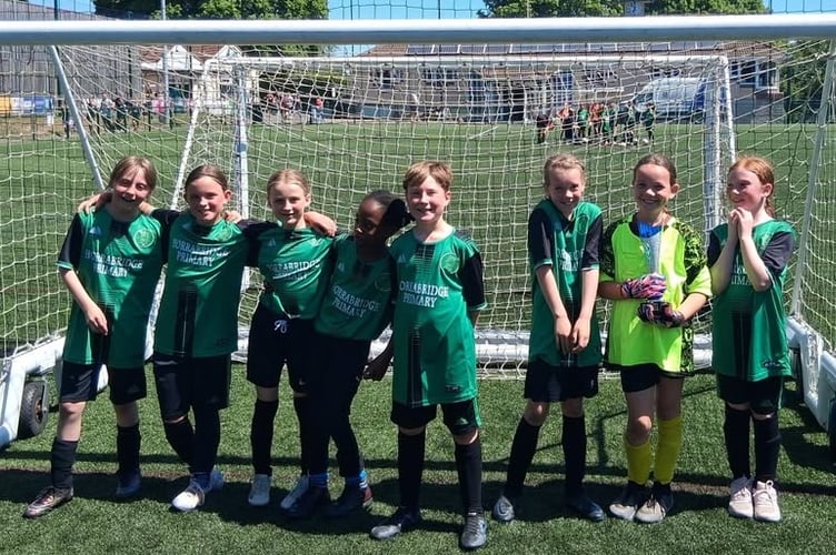 Horrabridge Horrabridge Primary School year 3/4 celebrate the Devon school girls football trophy