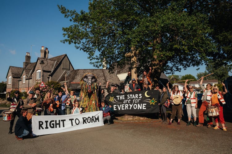 Right to Roam campaigners in Cornwood, celebrating the Supreme Court's decision to overturn a wild camping ban on Dartmoor.