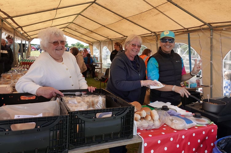 Bere Alston Fun Day. Kept busy in the refreshment tent were Jill Edwards, Philippa Wooldridge and Mustapha Garrabos. Picture by Ann Parsons.