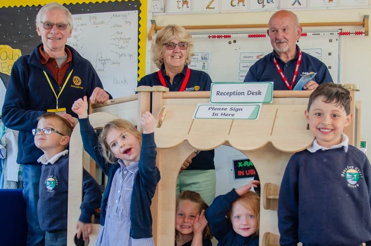 Pupils of Boasley Cross Primary School with members of the Rotary Club of Okehampton.