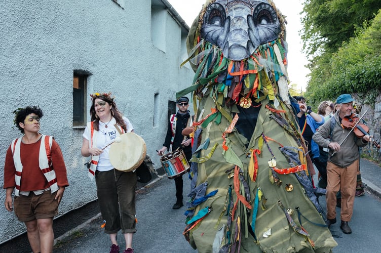 Right to Roam campaigners parading through Cornwood to mark the Supreme Court legal victory which allows wild camping on Dartmoor. 