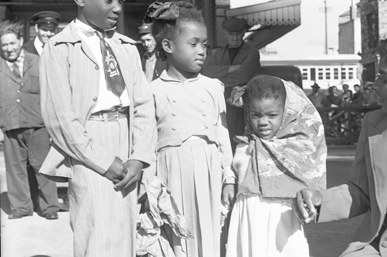 Tavistock's new multicultural festival in mid-June includes the Windrush exhibition from Plymouth's Box. Pictured is a West Indies family arriving at Millbay Docks, Plymouth, 1954. Image courtesy of The Box Plymouth, copyright Mirrorpix.