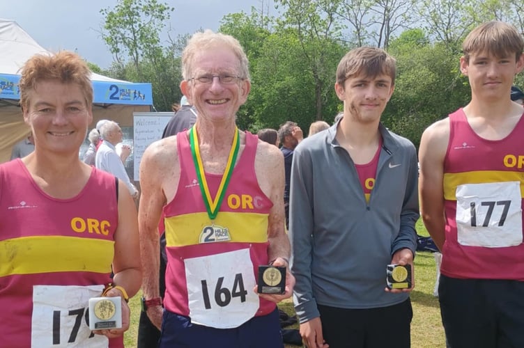 Okehampton Running Club runners with their medals after completing the Chagford Two Hills Race.