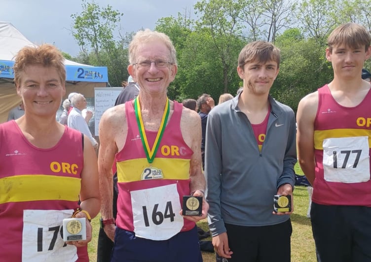 Okehampton Running Club runners with their medals after completing the Chagford Two Hills Race.
