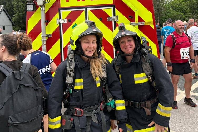Battling Princetown Firefighters take part in the charity 10km race in full kit.