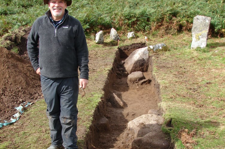 Local archaeologist Alan Endacott at his newly discovered stone circle portion and trench test, near the bottom of Irishman's Wall at Taw Marsh.
