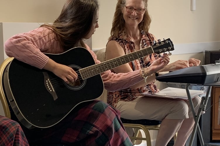 Mount Kelly College students and staff bring music and joy to Drake Lodge residents in Tavistock.