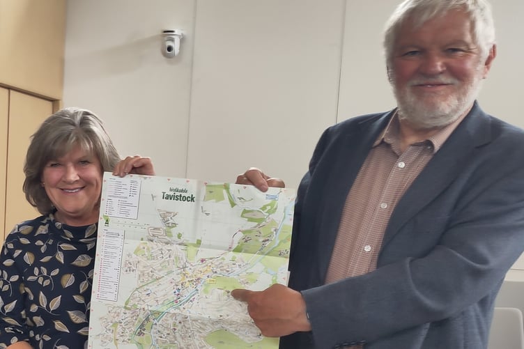 Devon county Cllr Debo Sellis and Tavistock Mayor Cllr Steve Hipsey and an updated accessible map of Tavistock by Transition Tavisto