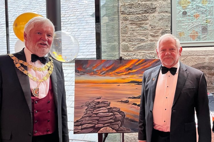 The Mayor of Tavistock Cllr Steve Hipsey (left) and former mayor Cllr Paul Ward at the TASS gala dinner auction