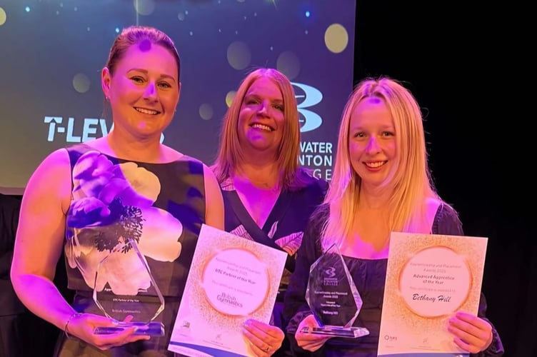 Okehampton Flyers coach Bethany Hill, right, being presented with her Advanced Apprentice of the Year Award from Bridgwater and Taunton College.