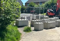 Residents protest new fence on estate