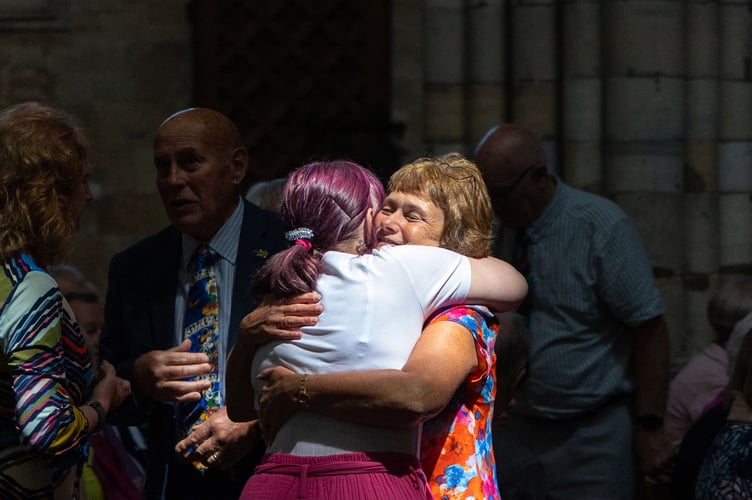 Guests arriving at the memorial service for Eddie Farwell.