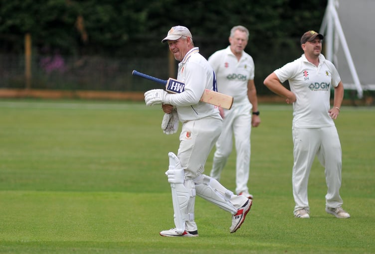 Devon Cricket League E Division West. Abbotskerswell 2nd XI versus Tavistock 2nd XI. Tavi's Steve Luffman returns to the pavilion courtesy of Abbots' bowler Vishalkumar Patel
Abbots won the toss and chose to field with Tavi going down 125 all out after 37 overs . After tea Abbots took to the crease making 128 for 5 after 38 overs and marked up a five wicket win