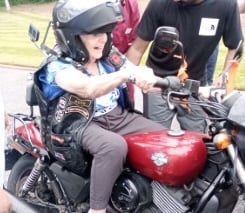 June Pearton astride a Harley Davidson motorbike for a birthday treat.