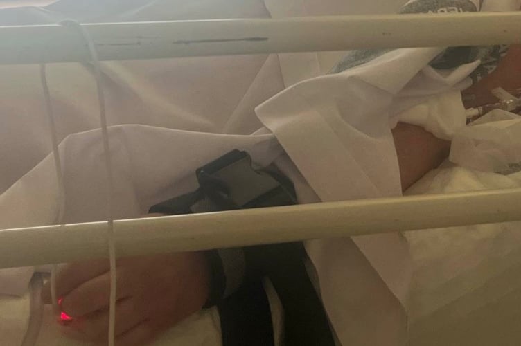 Katie has been put in double restraints.