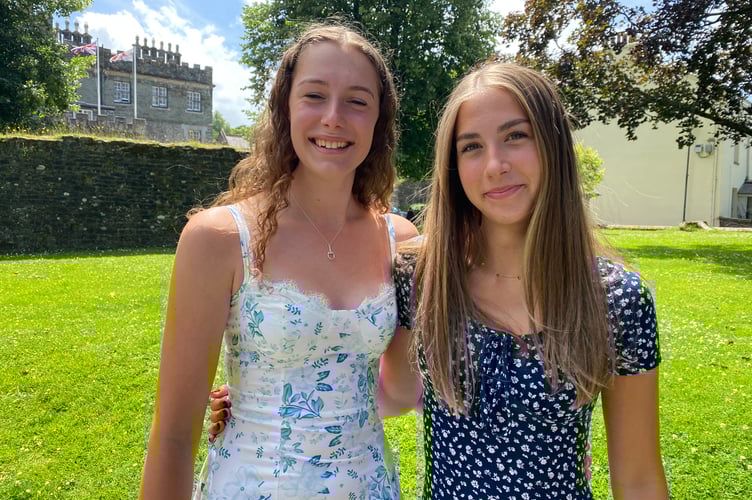 Tavistock College A-level student graduation ceremony with  L to R: Bryony and Chloe at St Eustachius' Church.