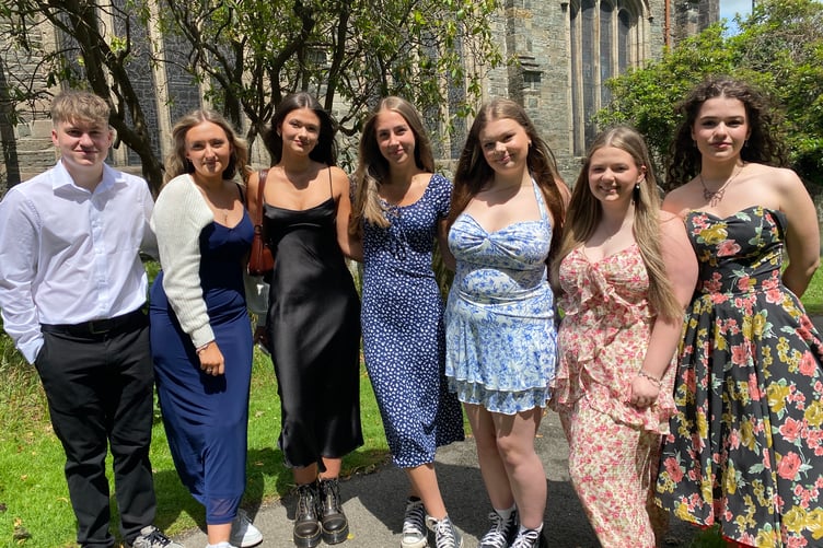 Happy Tavistock College A-level students at their graduation ceremony on Thursday, June 26, in St Eustachius' Church. R to L: Lily, Evie, Mae, Chloe, Poppy, Lily and Seth.