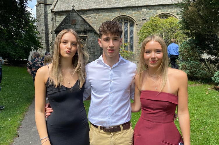 Tavistock College A-level graduation ceremony with graduates (L to R) Emily, Charlton and Maisy. 
