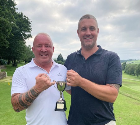 Title winners Lee Carey and Jack Whiteway