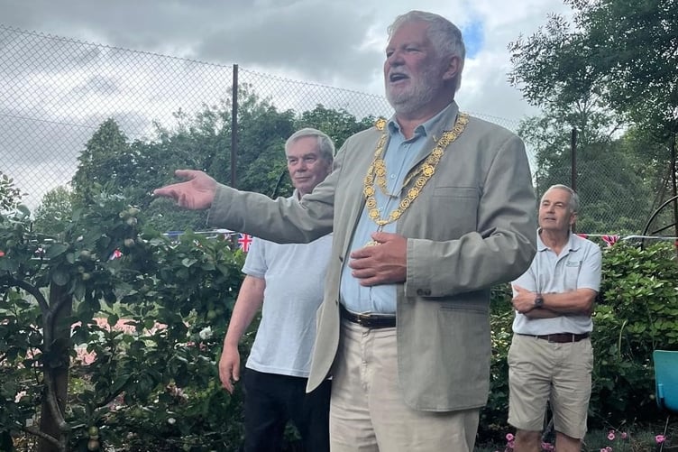 Tavistock Mayor Cllr Steve Hipsey giving a solo rendition as a Tavy Tar sea shanty singer at Tavistock Sensory Garden summer party.