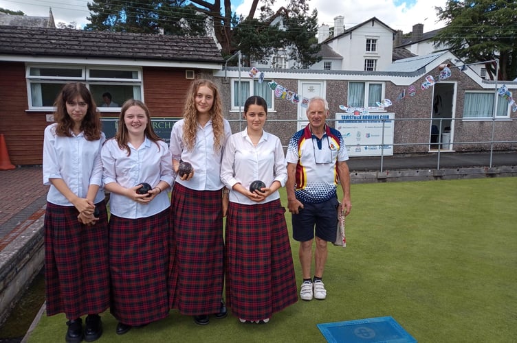 Mount Kelly College students having lawn bowls taster coaching session to help mark TASS fortieth anniversary.