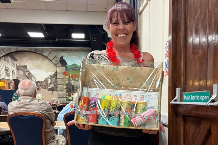 Callington Lions bingo regular Kerry bagged the prize of Summer cocktails at the special Summer Bingo evening at the end of June. (Picture: Callington Lions)