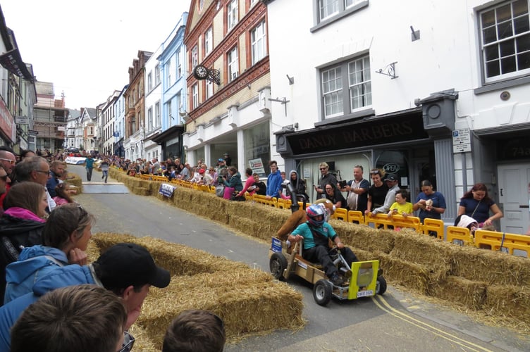 The route is a 600-metre downhill slope at 15 per cent with hay bales, ramps and water showers.